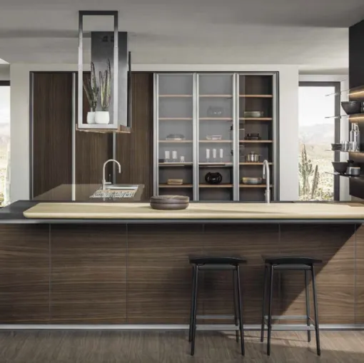 Cucina Design con penisola HiLine 6 Frame Door con base in Noce, top in acciaio Inox e Nero Lava, banco snack in Rovere biondo nodato di Molteni & C